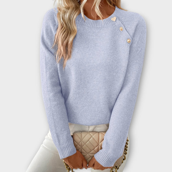 Elina | Stickad tröja – Asymmetrisk design med feminina detaljer