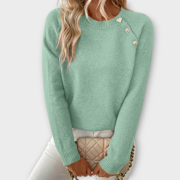 Elina | Stickad tröja – Asymmetrisk design med feminina detaljer